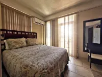 Timbo's Apartelle Hotéis em 