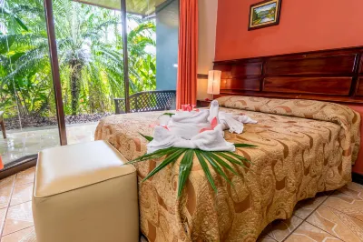 Ara Ambigua Lodge Отели в г. 