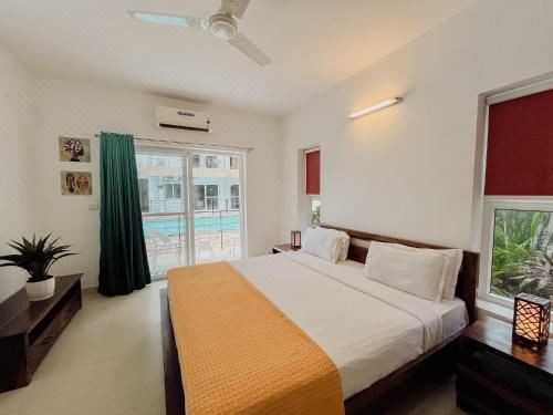 Rainforest Enclave, Arpora - 10 Mins to Baga Beach Apartment With Pool View