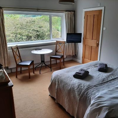 Double Room Ensuite with Mountain View Coach House Promo Code