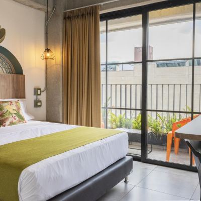 Deluxe Double Room, 1 King Bed, Balcony, City View Los Patios Hostel Promo Code