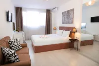 City Plaza Apartments & Rooms Hotel a 
