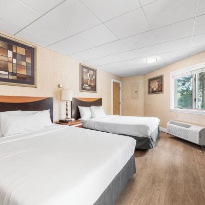 Luxury Room, 2 Queen Beds, Smoking, Jetted Tub Cedar Park Inn Promo Code