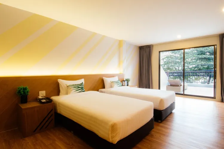 ห้องดีลักซ์เตียงใหญ่หรือเตียงแฝดพร้อมวิวทะเล