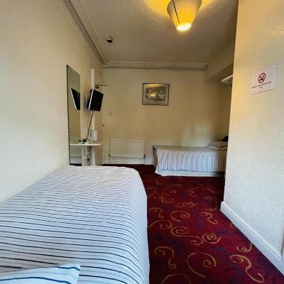 Attic Twin Room With Shared Bathroom The Roadhouse Hotel Promo Code