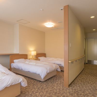 ユニバーサルセミウェスタンスタイルルーム 城崎温泉　あさぎり荘～露天風呂付大浴場と板長考案の料理が好評 クーポン