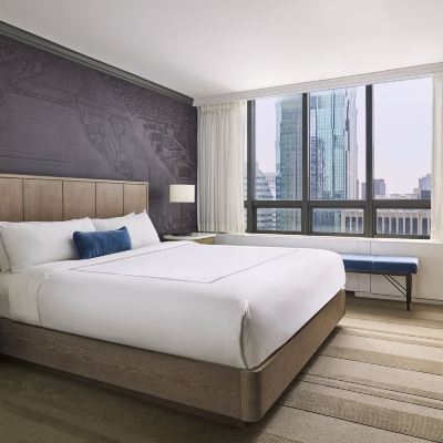 Deluxe King Suite The Marquette Hotel, Curio Collection by Hilton Promo Code