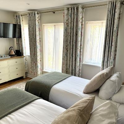 Double or Twin Room Thatched Cottage Hotel Promo Code