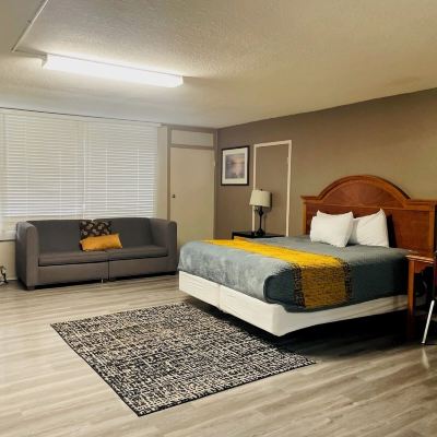 Deluxe Single Room APM Inn & Suites Promo Code
