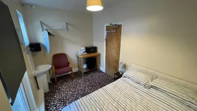 Bayside Guest House Отели в г. 