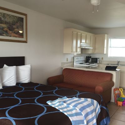 Deluxe King Suite Port Isla Inn Promo Code