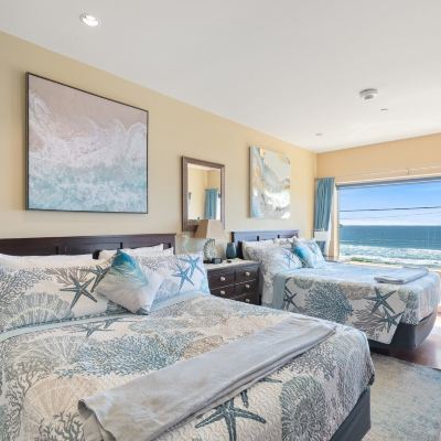 Deluxe Suite, 2 Queen Beds, Ocean View, Corner Three Arch Inn Promo Code