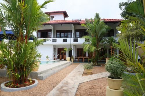 Hotel Sky and Sand Guesthouse, Exterior, Garden