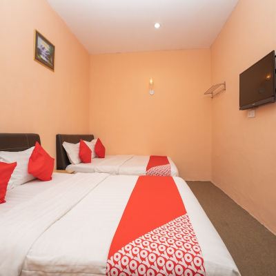Bilik Family Double Kupon OYO 89328 SZ Hotel