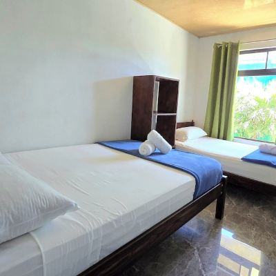 Economy Triple Room, Shared Bathroom Hostel Cattleya Promo Code