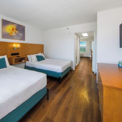 Suite, 2 Double Beds, Kitchen, Beachfront (Ocean/Gulf View) Beachcomber by The Sea Promo Code