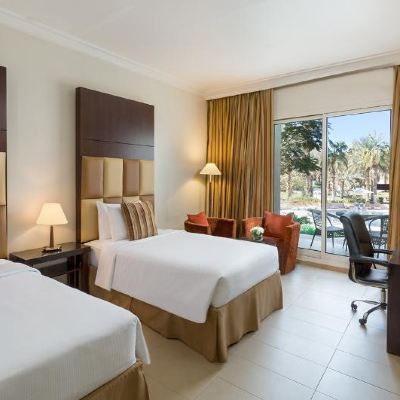 Deluxe King Room Pool View Millennium Central Mafraq Hotel Promo Code