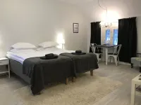 Green Door Apartments Hotel di 