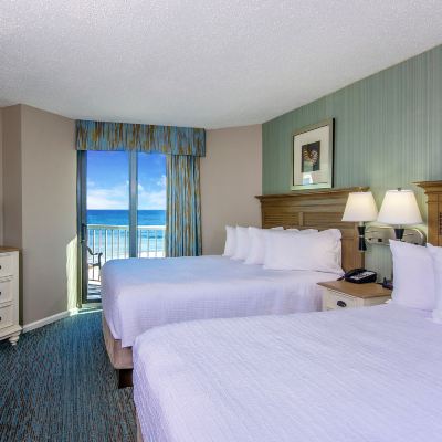 Oceanfront Deluxe One Bedroom Queen Condo The Strand - A Boutique Resort Promo Code