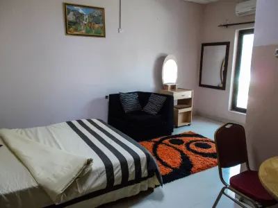 Leget Lodges & Gardens Hotel di 