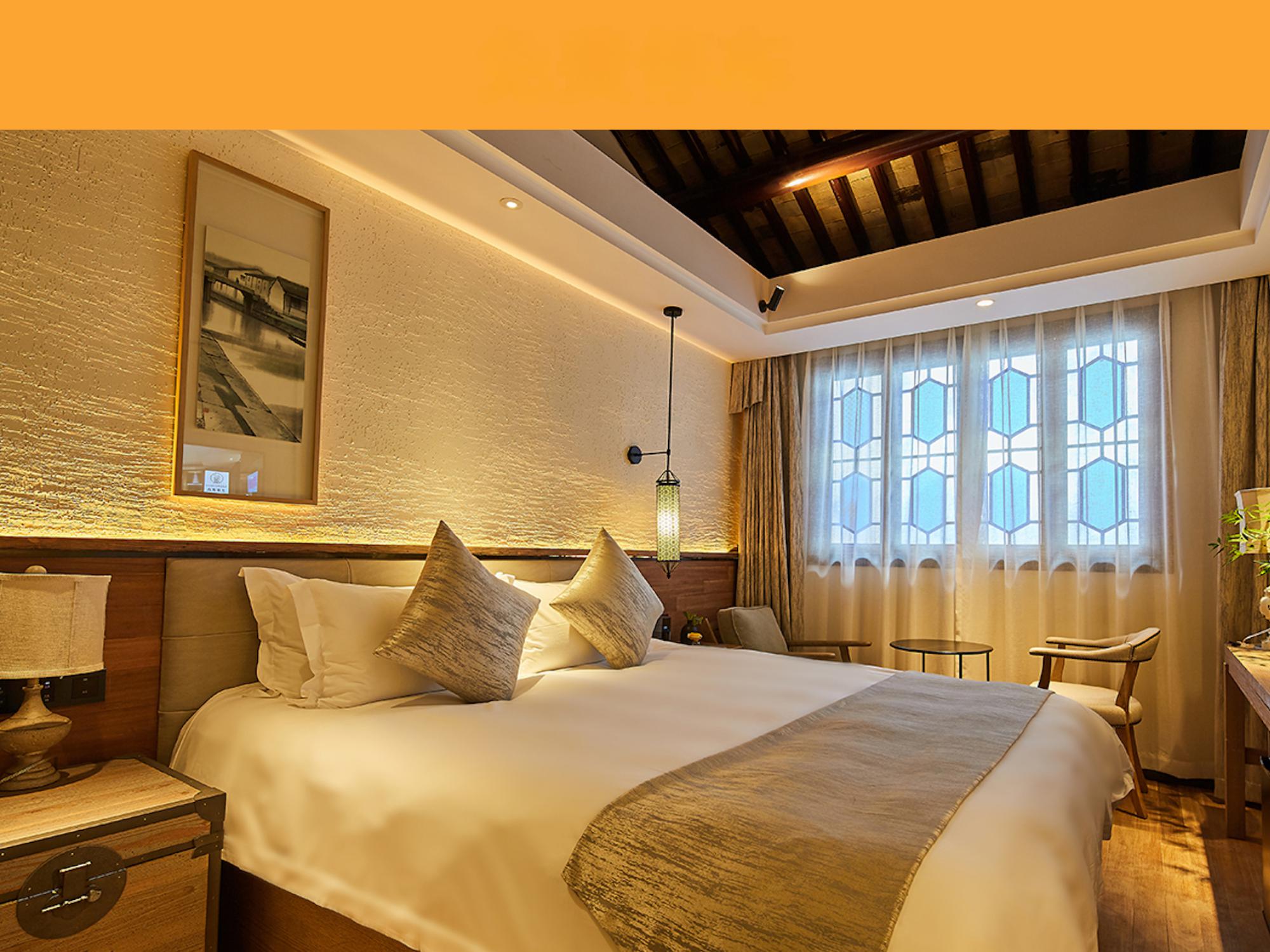 Yiman Hotel (Suzhou Guanqianjie Pingjiang Road Scenic Area)民国大床房（智能声控+小冰箱+乐家衞浴）