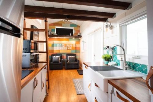 Lofted Bedroom Teal Tiny Home with Creek Views One-Bedroom House
