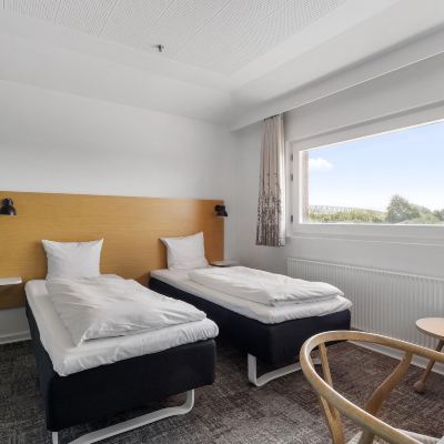 Economy Room, 2 Twin Beds, Non Smoking Trinity Hotel & Konference Center Promo Code