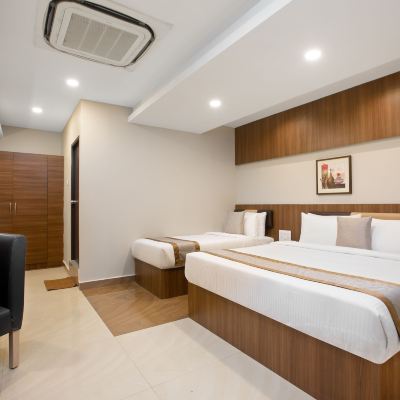 Premium Triple Room, Multiple Beds, Non Smoking, Refrigerator Grande Inn Trichy Promo Code