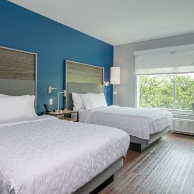 Guest Room With 2 Queen Beds And Walk In Shower Lawrence Hotel Group, LLC Promo Code