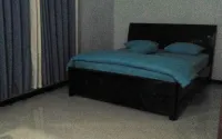 Comfy Room at Honey Guesthouse Syariah โรงแรมใน