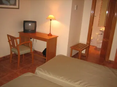Hotel Chané Отели в г. 