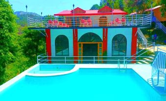 Aamod at Shoghi Luxury Cottage Resort