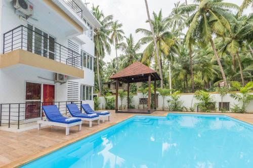 Rainforest Enclave, Arpora - 10 Mins to Baga Beach Apartment With Pool View