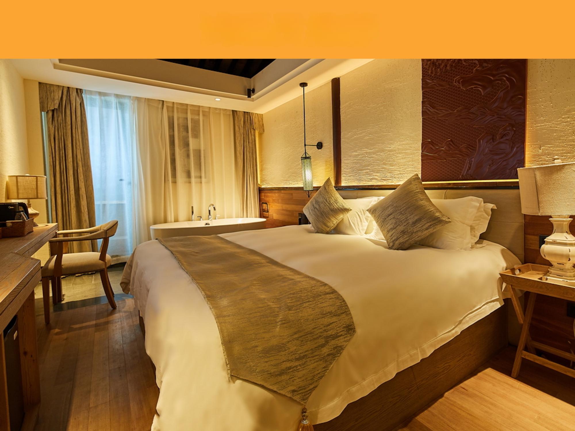 Yiman Hotel (Suzhou Guanqianjie Pingjiang Road Scenic Area)民国豪华大床房（智能声控+小冰箱+乐家泡澡大浴缸）