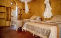 Turtle Cove Lodge and Yoga Shala โรงแรมใน