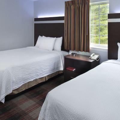Suite, Multiple Beds Luxbury Inn & Suites Promo Code