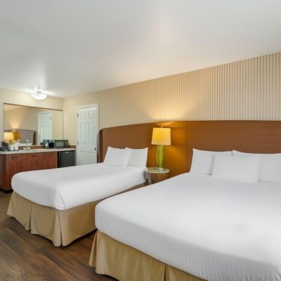 Deluxe Room - 2 Queen Beds Rogue Regency Inn & Suites Promo Code