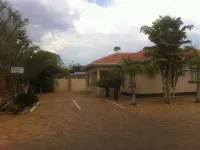 Cycad Palm Guest House Отели в г. 