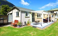 Okiwi Bay Cosy Cottage โรงแรมใน