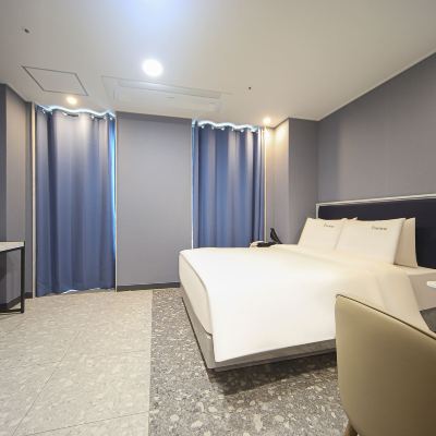 디럭스 더블룸 더뮤즈호텔 레지던스 쿠폰