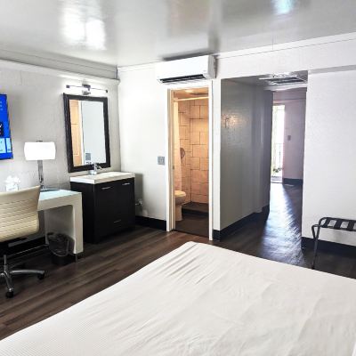 Suite-1 King Bed, Non-Smoking, Separate Bedroom, 2 Flat Screen Tvs, Living Room, Sofa, Mini Fridge The Clarendon Hotel and Spa Promo Code