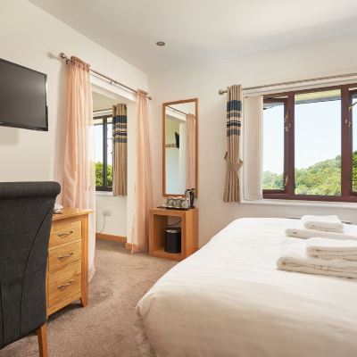 Deluxe Triple Room The Windmill Inn Promo Code