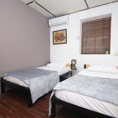 Bilik Kembar Kupon SPOT ON 90141 Threehouse Bed & Breakfast