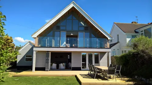 Beach Front Holiday Home on Private Estate with Sea Views.   100+  Reviews!
