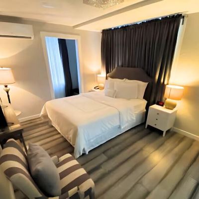 Economy Single Room, 1 Queen Bed, Refrigerator, City View Artisan Downtown Promo Code