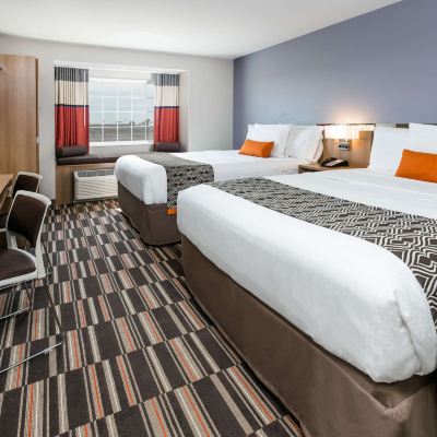 Deluxe Queen Room With Two Queen Beds-Non-Smoking Microtel Inn and Suites by Wyndham Monahans Promo Code