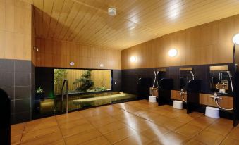a room with wooden walls and floors has a large window showing an interior of a temple at Hotel Route-Inn Fuji Chuo Koen Higashi