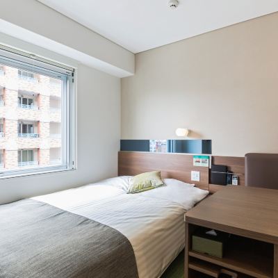 エキストラルーム(ダブルベッド+広いデスク) スーパーホテル Lohas 博多駅・筑紫口天然温泉 クーポン