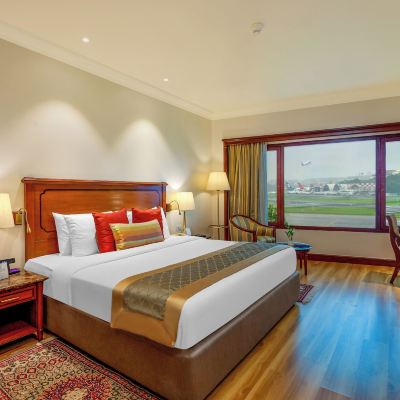 Club Room King Bed with Complimentary Airport Drop, Happy Hours The Orchid Hotel Mumbai Vile Parle Promo Code