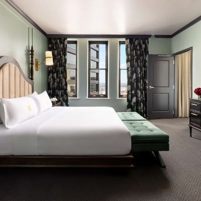 Mobility Accessible One King One Bedroom Suite with Roll in Shower The Candler Hotel Atlanta, Curio Collection by Hilton Promo Code